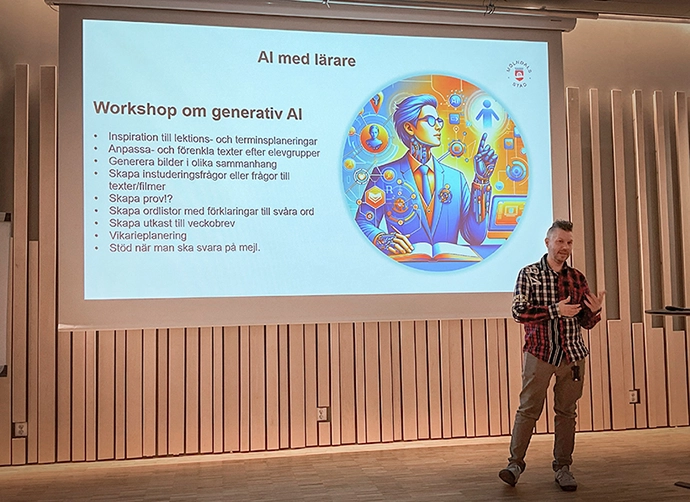 person på scen med presentation